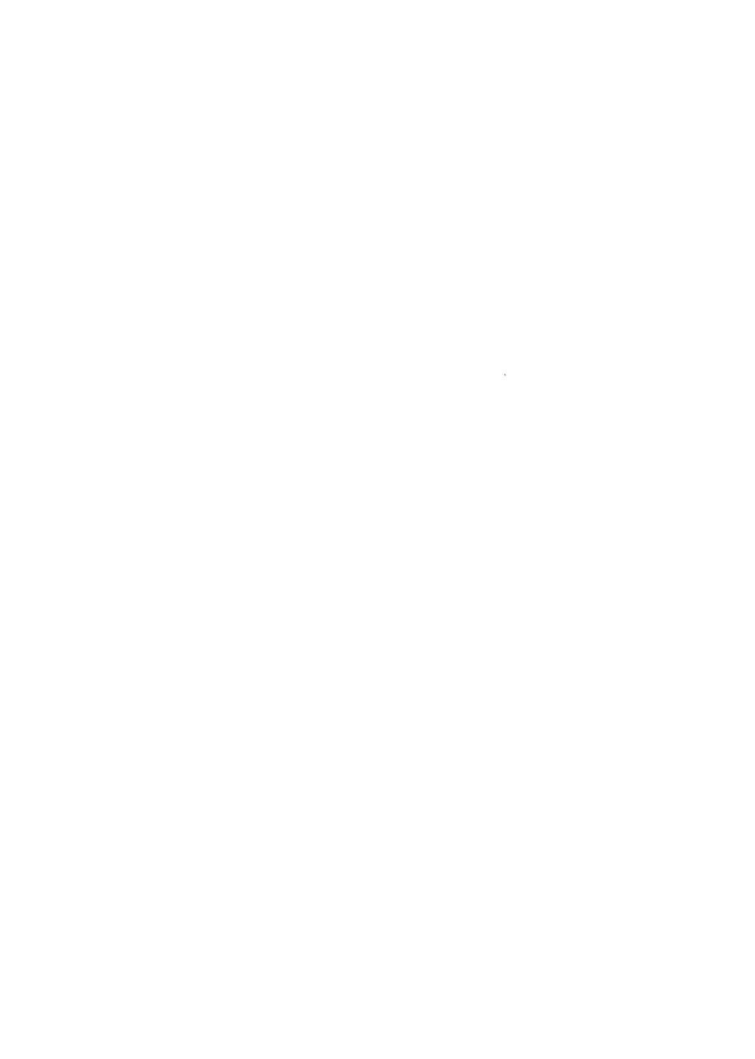 A woman talking on her mobile while looking at her computer monitor.